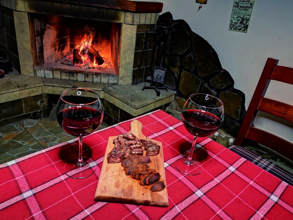 Two glasses of wine on the table in the tavern