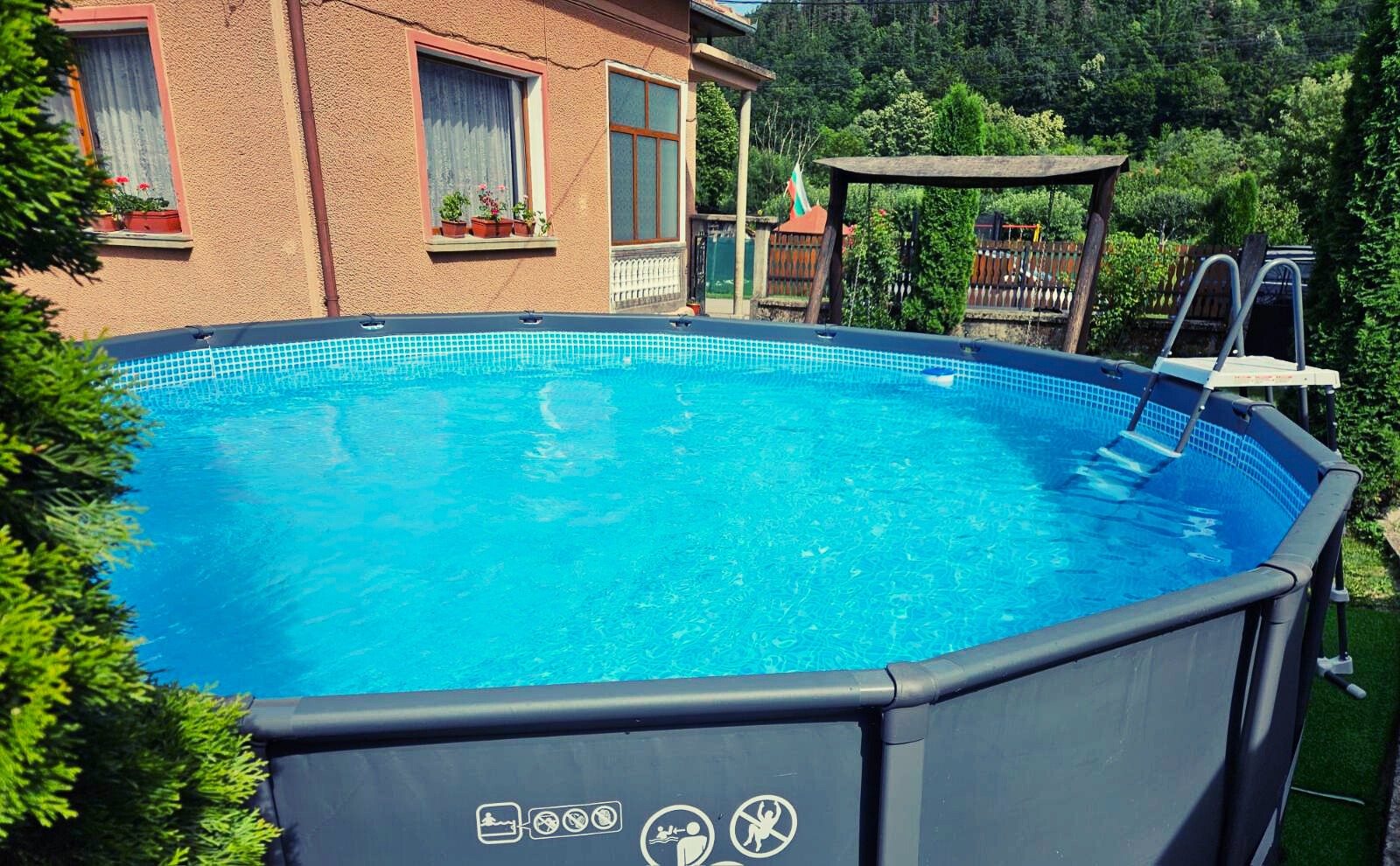 The same big pool in the garden, but from a different angle.